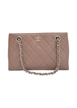 VINTAGE CHANEL PURPLE HANDBAG