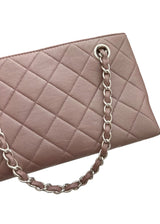 VINTAGE CHANEL PURPLE HANDBAG