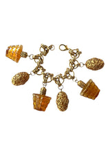 VINTAGE GOLD-TONE RESIN CHARM BRACELET